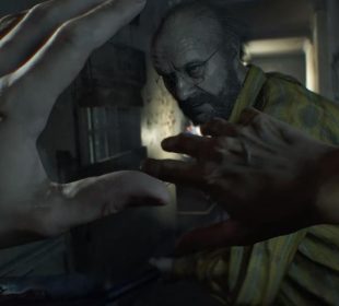 Ethan Winters being attacked by Jack in Resident Evil 7: Biohazard